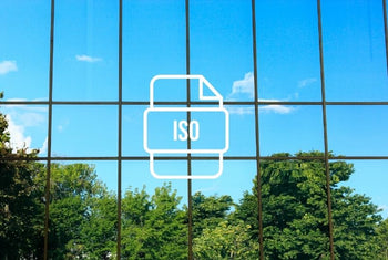 ISO icon on a glass business building